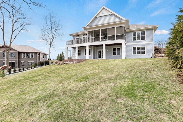 E12275 Timber Ridge Trl, Prairie Du Sac, WI 53578 - back of property with a yard, a sunroom, and fence