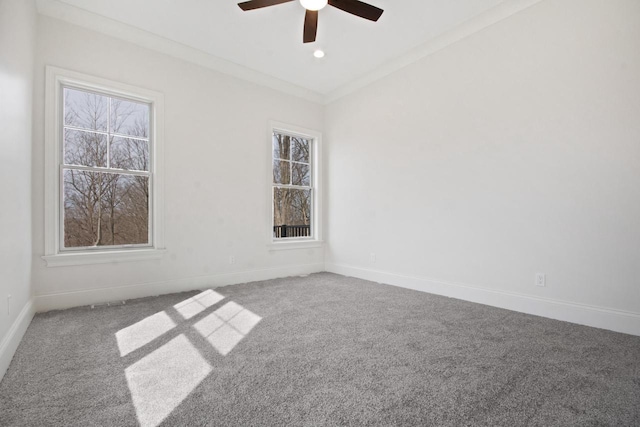 N2692 Forest Dr, Lake Geneva, WI 53147 - carpeted empty room featuring healthy amount of natural light, a ceiling fan, and baseboards