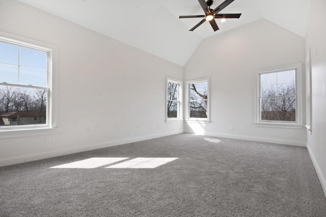 N2692 Forest Dr, Lake Geneva, WI 53147 - carpeted empty room with ceiling fan, plenty of natural light, baseboards, and high vaulted ceiling