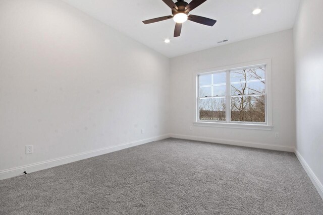 N2692 Forest Dr, Lake Geneva, WI 53147 - spare room featuring carpet flooring, a ceiling fan, baseboards, and recessed lighting