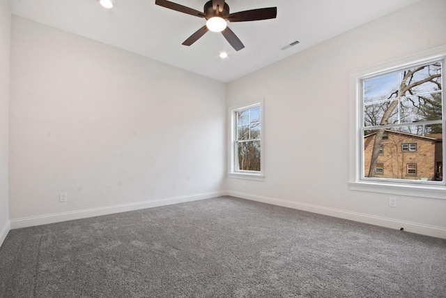 N2692 Forest Dr, Lake Geneva, WI 53147 - empty room with plenty of natural light, carpet floors, a ceiling fan, baseboards, and recessed lighting