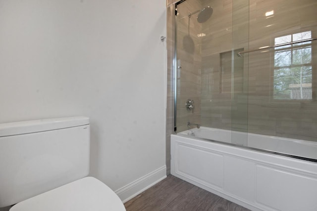 N2692 Forest Dr, Lake Geneva, WI 53147 - full bath with toilet, enclosed tub / shower combo, baseboards, and wood finished floors