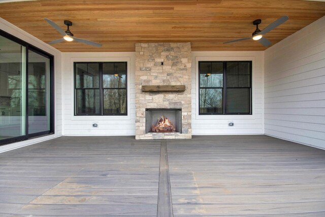 N2692 Forest Dr, Lake Geneva, WI 53147 - deck with a fireplace and ceiling fan