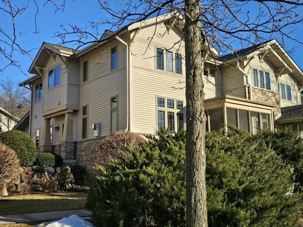 57 Wood Brook Way, Fitchburg, WI 53711 - view of side of property featuring a sunroom