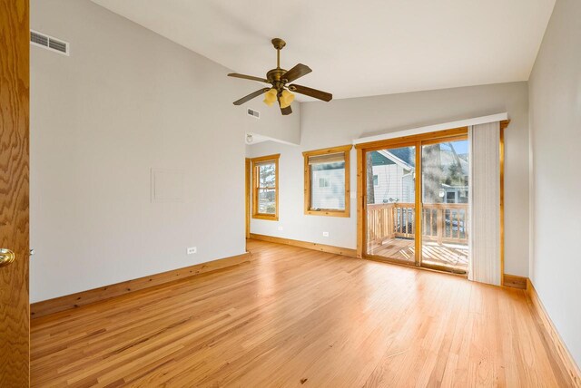556 Highland Rd, Williams Bay, WI 53191 - unfurnished room featuring light wood finished floors, vaulted ceiling, baseboards, and a ceiling fan