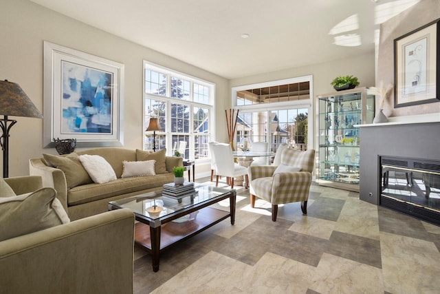 living area with a multi sided fireplace