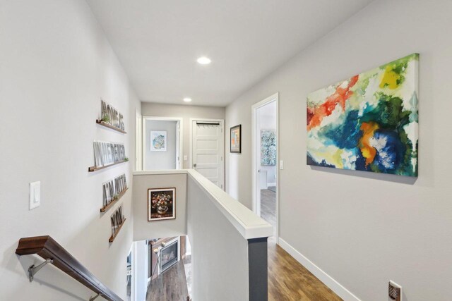 328 Venus Way, Madison, WI 53718 - hallway featuring baseboards, an upstairs landing, wood finished floors, and recessed lighting