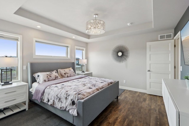 328 Venus Way, Madison, WI 53718 - bedroom with visible vents, an inviting chandelier, and a raised ceiling