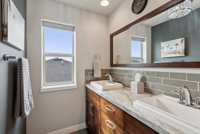 328 Venus Way, Madison, WI 53718 - full bath featuring backsplash, double vanity, and a sink