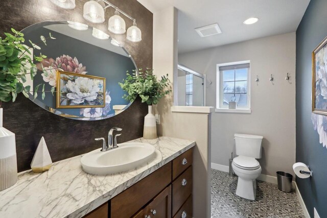 328 Venus Way, Madison, WI 53718 - full bath with toilet, an enclosed shower, vanity, tile patterned flooring, and baseboards