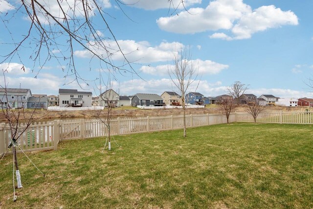 328 Venus Way, Madison, WI 53718 - view of yard featuring a fenced backyard and a residential view