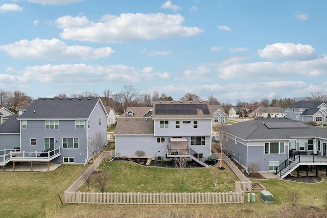 328 Venus Way, Madison, WI 53718 - back of house with stairway, a fenced backyard, a residential view, a deck, and a lawn