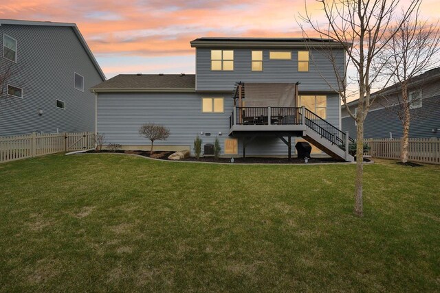 328 Venus Way, Madison, WI 53718 - back of house featuring a lawn, a fenced backyard, a wooden deck, and stairway