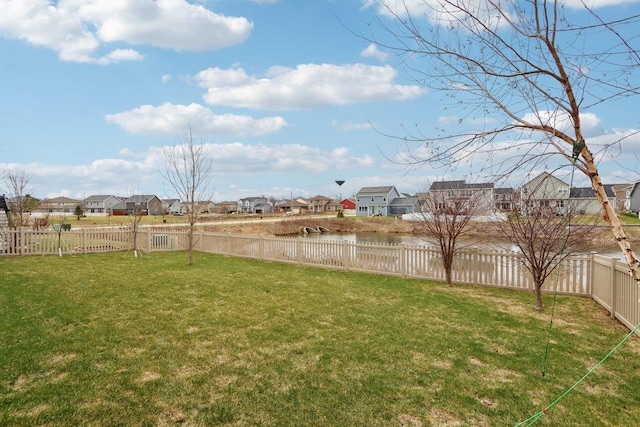 328 Venus Way, Madison, WI 53718 - view of yard featuring a water view, a fenced backyard, and a residential view