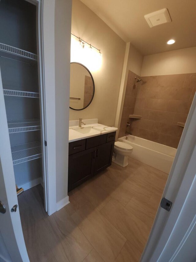 5684 N Kestrel Cir, Appleton, WI 54913 - bathroom with toilet, shower / tub combination, recessed lighting, and vanity