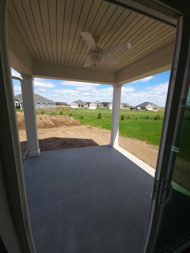 5684 N Kestrel Cir, Appleton, WI 54913 - view of patio with ceiling fan and a residential view