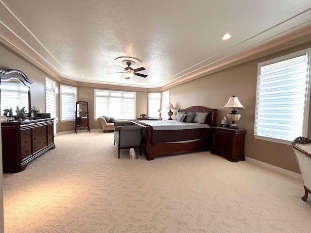 25621 Honeycut Ave, Tomah, WI 54660 - bedroom featuring a textured ceiling, baseboards, recessed lighting, a ceiling fan, and light carpet