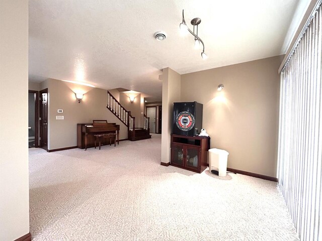 25621 Honeycut Ave, Tomah, WI 54660 - living area featuring carpet flooring, baseboards, stairs, and visible vents