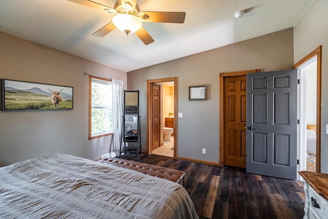 N1179 County Road O, Stoddard, WI 54658 - bedroom with vaulted ceiling, baseboards, a textured ceiling, connected bathroom, and wood finished floors