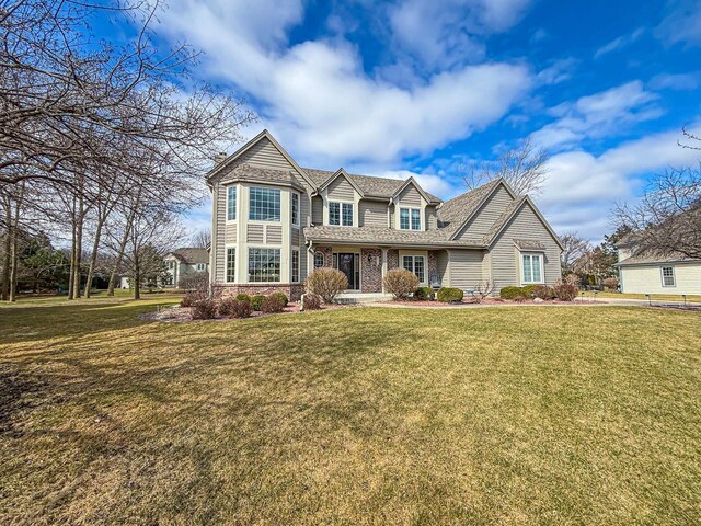 view of front of home with a front yard