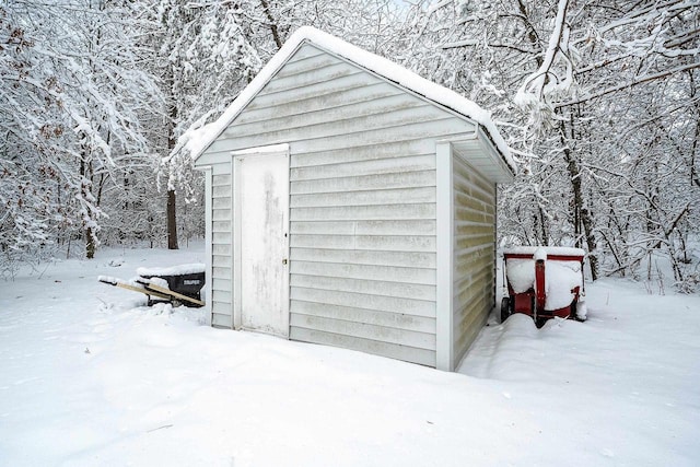 W11490 Boat Landing 7 Rd, Athelstane, WI 54104 - snow covered structure with a storage unit and an outdoor structure