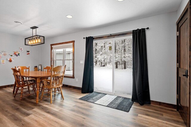 W11490 Boat Landing 7 Rd, Athelstane, WI 54104 - dining room featuring baseboards, recessed lighting, and light wood finished floors