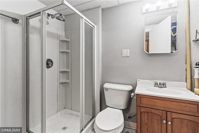 806 Oak Ridge Dr, Osceola, WI 54020 - full bathroom with vanity, a shower stall, toilet, and a paneled ceiling