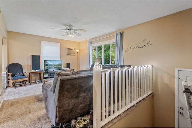 806 Oak Ridge Dr, Osceola, WI 54020 - living area featuring ceiling fan, carpet floors, and a wall mounted air conditioner