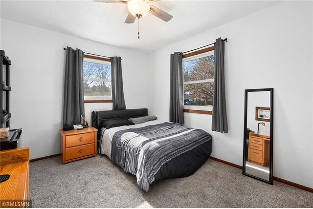 3374 Gerrard Ave, Eau Claire, WI 54701 - carpeted bedroom with baseboards and ceiling fan
