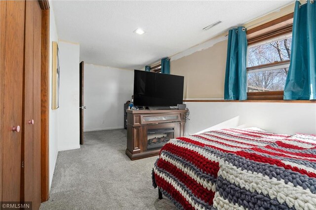 3374 Gerrard Ave, Eau Claire, WI 54701 - carpeted bedroom with baseboards and visible vents