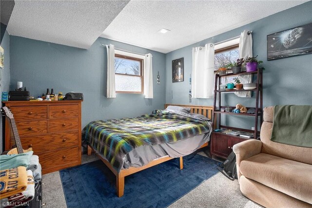3374 Gerrard Ave, Eau Claire, WI 54701 - carpeted bedroom with a textured ceiling