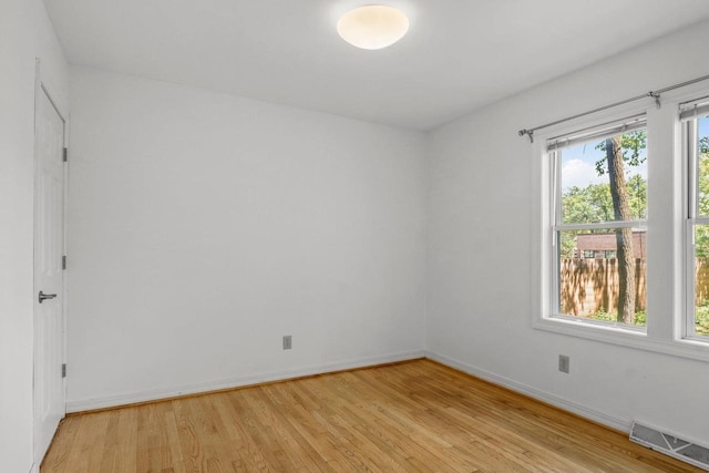 725 Eugenia Ave, Madison, WI 53705 - empty room with light wood-type flooring and baseboards