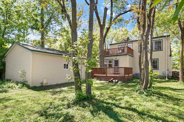 725 Eugenia Ave, Madison, WI 53705 - view of grassy yard featuring a balcony, a wooden deck, and central AC unit