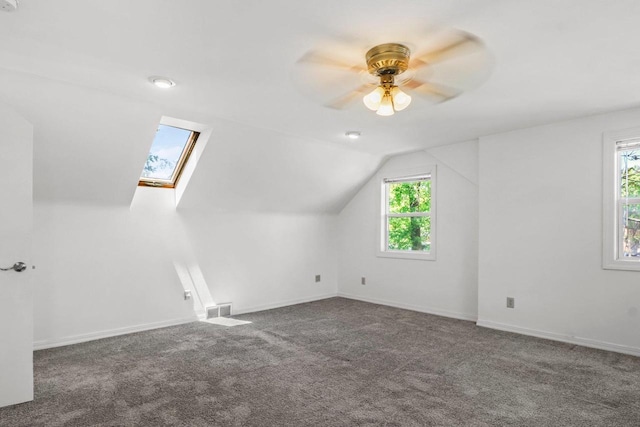 725 Eugenia Ave, Madison, WI 53705 - bonus room with ceiling fan, plenty of natural light, carpet, vaulted ceiling, and baseboards