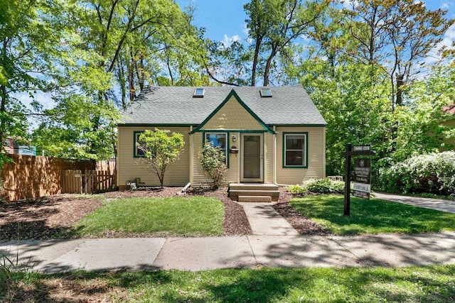 725 Eugenia Ave, Madison, WI 53705 - view of front of home with a shingled roof