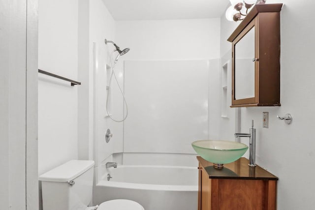 725 Eugenia Ave, Madison, WI 53705 - bathroom featuring toilet, vanity, and tub / shower combination