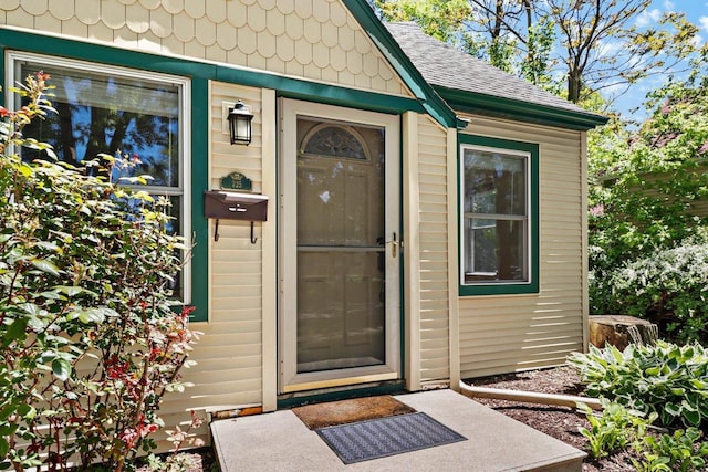 725 Eugenia Ave, Madison, WI 53705 - view of exterior entry featuring a shingled roof