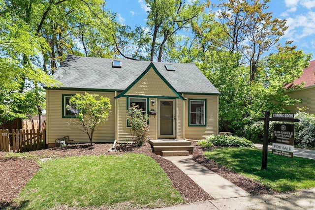 725 Eugenia Ave, Madison, WI 53705 - view of front facade featuring roof with shingles