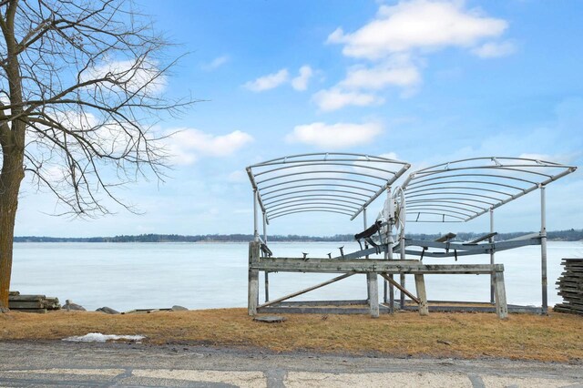 36082 N Beach Rd, Oconomowoc, WI 53066 - dock area featuring a water view