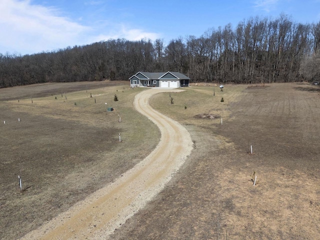 W4668 Reetz Rd, Princeton, WI 54968 - view of rural area featuring a heavily wooded area