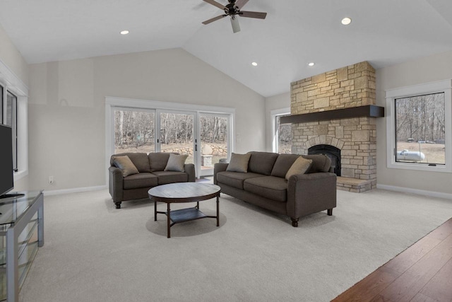 W4668 Reetz Rd, Princeton, WI 54968 - living room with ceiling fan, healthy amount of natural light, baseboards, recessed lighting, and high vaulted ceiling