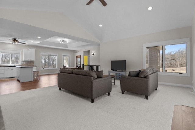 W4668 Reetz Rd, Princeton, WI 54968 - living room with ceiling fan, light carpet, recessed lighting, baseboards, and a raised ceiling