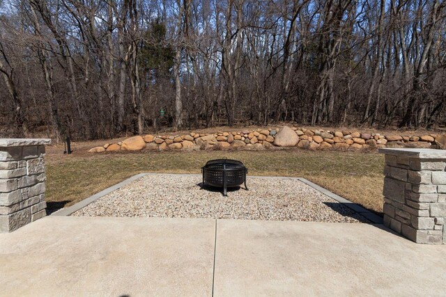 W4668 Reetz Rd, Princeton, WI 54968 - view of patio / terrace with an outdoor fire pit