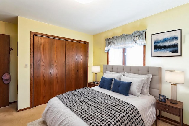 W3736 Oak St, Montello, WI 53949 - bedroom with light carpet, baseboards, and a closet