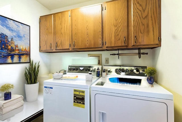 W3736 Oak St, Montello, WI 53949 - washroom with washing machine and clothes dryer and cabinet space