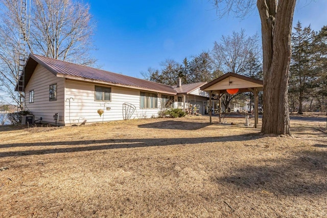 W3736 Oak St, Montello, WI 53949 - rear view of property with metal roof