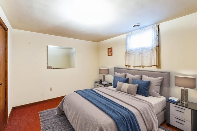 W3736 Oak St, Montello, WI 53949 - bedroom with baseboards, carpet floors, and visible vents