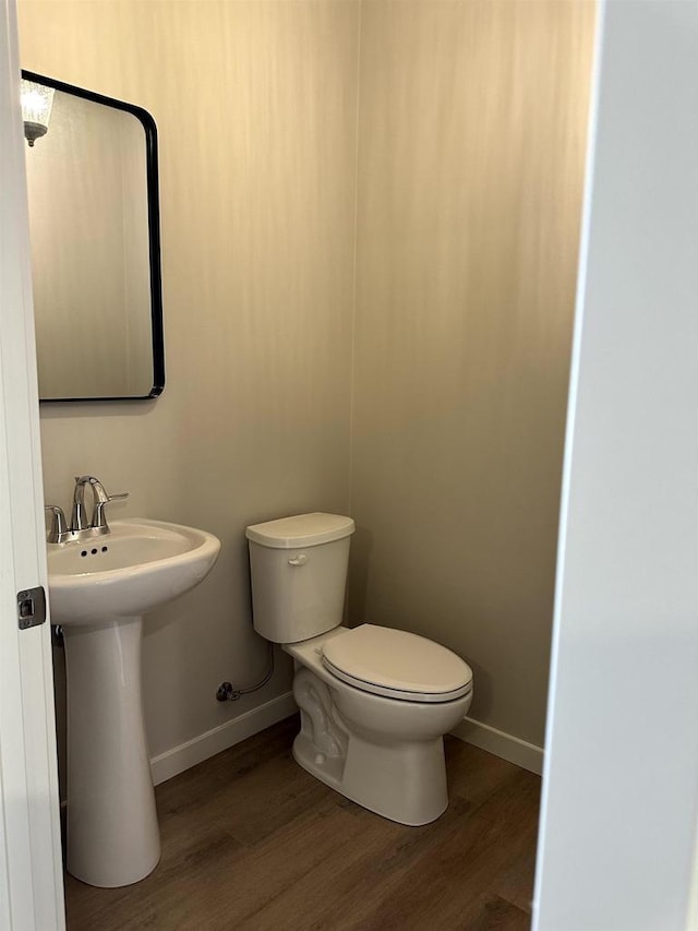 N9249 Constellation Dr, Appleton, WI 54915 - bathroom featuring toilet and wood finished floors