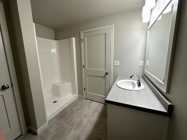 N9249 Constellation Dr, Appleton, WI 54915 - full bath with a walk in shower, vanity, and wood finished floors