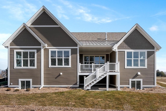 W214N4987 Casey Ct, Menomonee Falls, WI 53051 - back of house featuring a yard, stairs, and a shingled roof